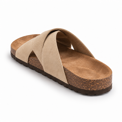 Cove Cross-Strap Slides in Sand, EU 37–45, rear three-quarter elevated view showing the open heel and inner footbed, whole shoe visible; do not show an invented outsole tread